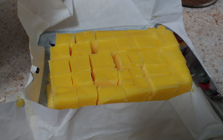 Butter chopped into cubes ready for mixing into a chocolate powder mixture