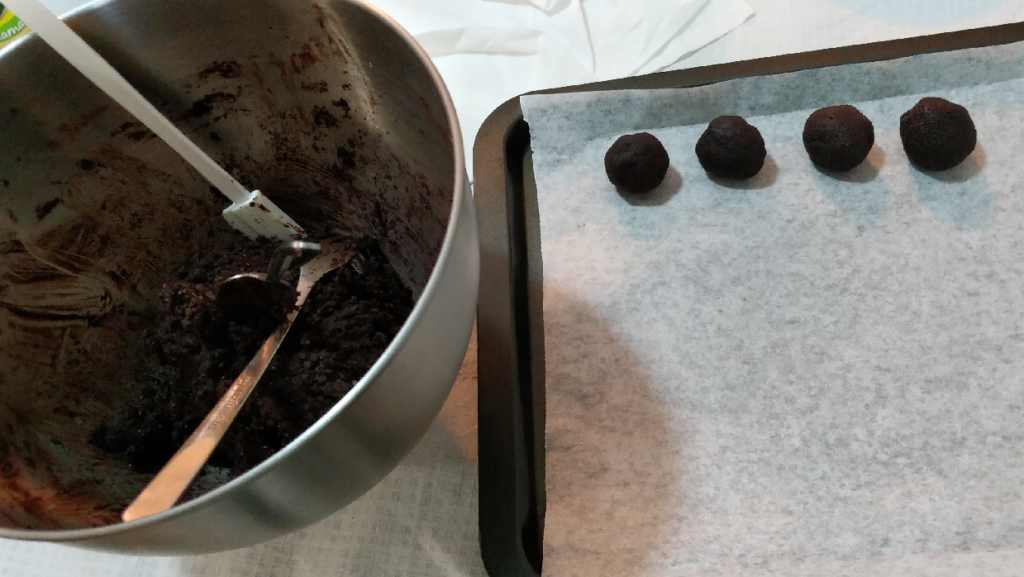 Shaping chocolate mixture into tablea balls