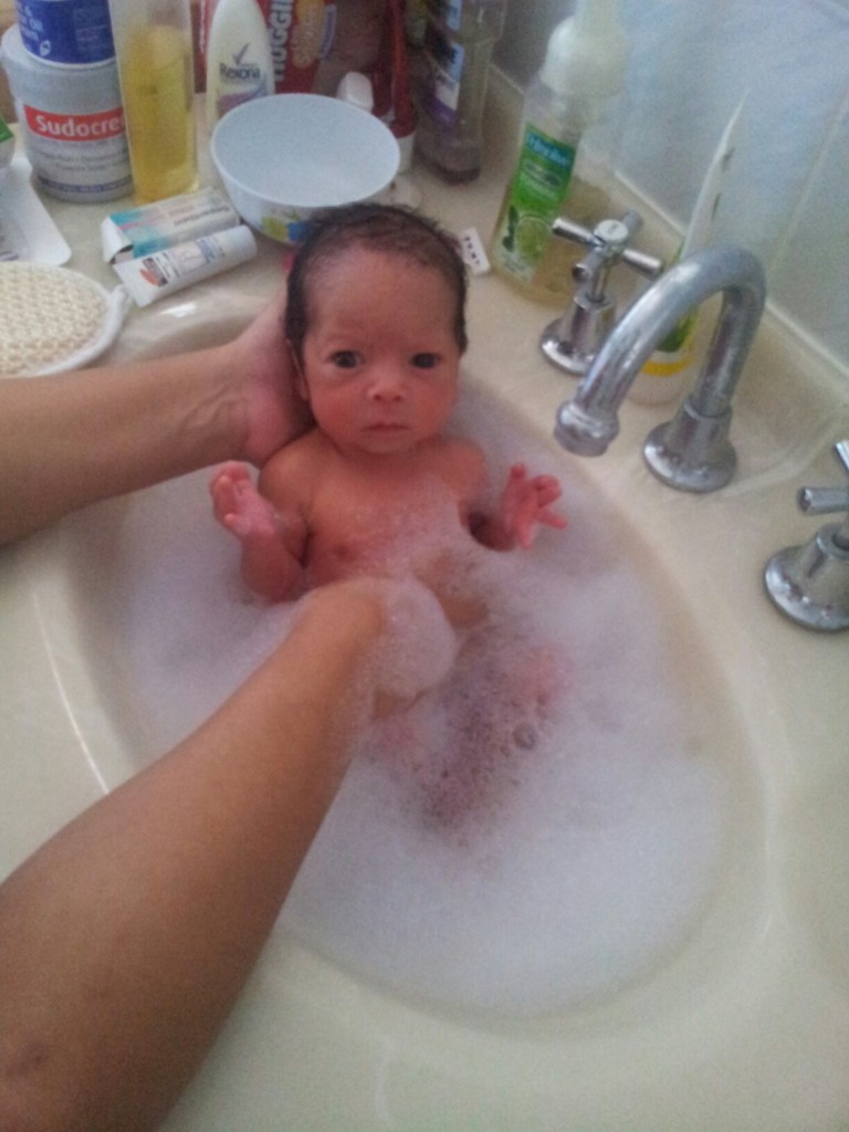 He is not crying. I will take that as he likes the bath but is unsure of the bubbles.
