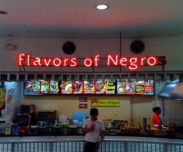 We're going with the intentionally funny use of language, not the 'lost in translation and cultural myopia' type. 'Negros' is the name of a region in the Philippines, and has nothing to do with American history, or racism.