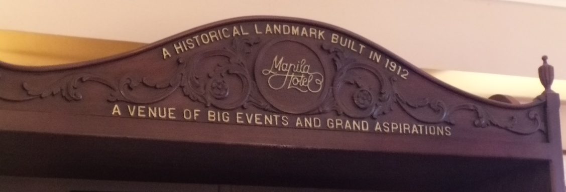 Manila Hotel logo and carving