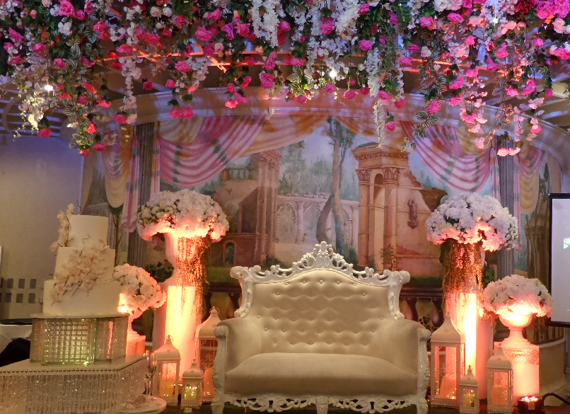 Wedding cake and couple 'throne.'